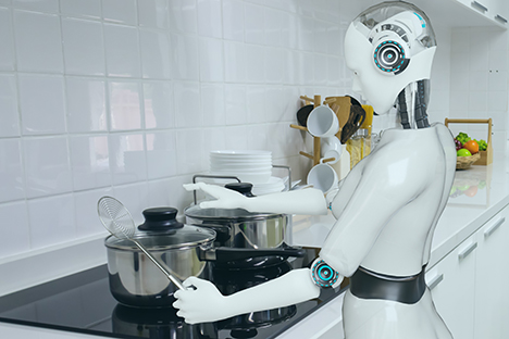 Un robot humanoide de Tesla cocinando. 